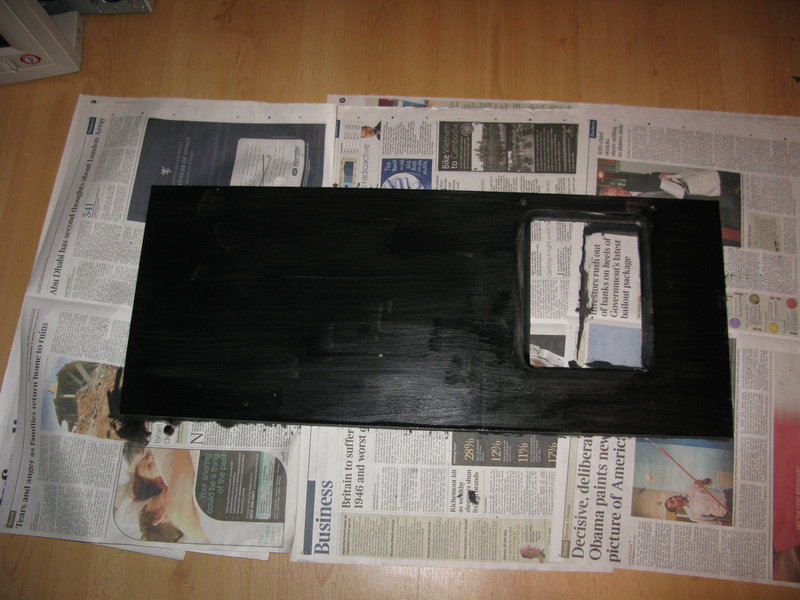 The replacement cupboard door, with blackboard paint